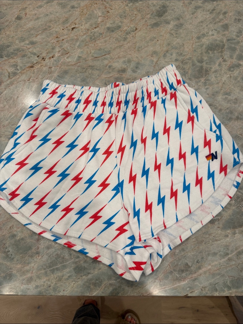 Aviator Nation White Shorts with Red & Blue Lightning Print